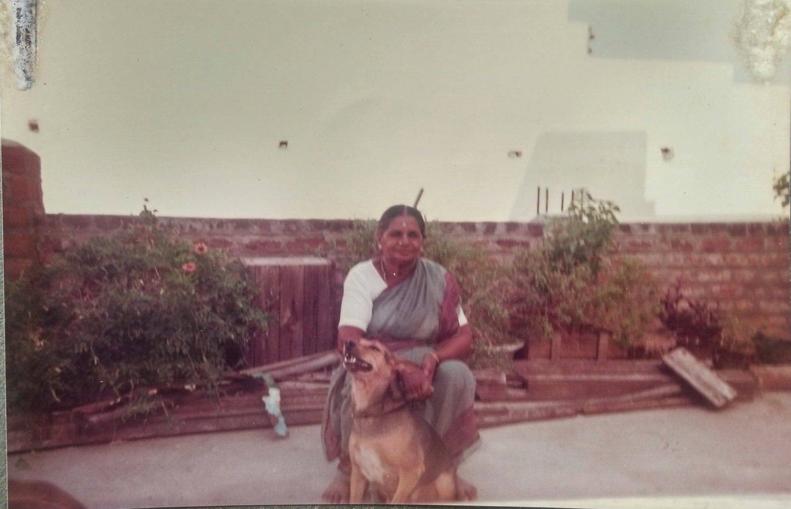 1990 | His pet, Mani with his grandmother